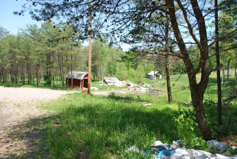 The trailer used to be to the right of the red shed